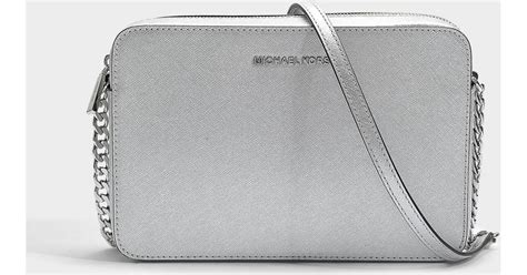 silver michael kors crossbody|Michael Kors metallic silver handbags.